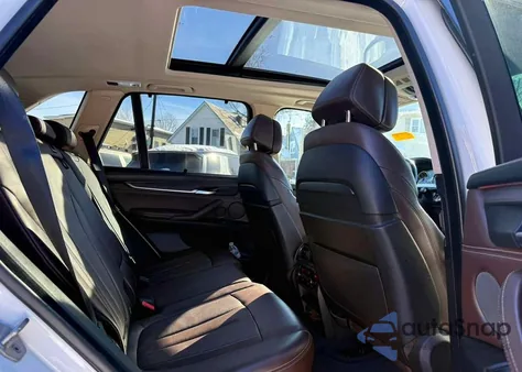 2014 BMW X5 xDrive50I z USA, uszkodzony, nr VIN 5UXKR6C56E0J73696